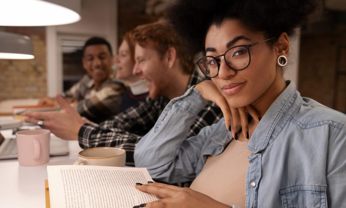 Professional investment consultation meeting with financial documents and charts