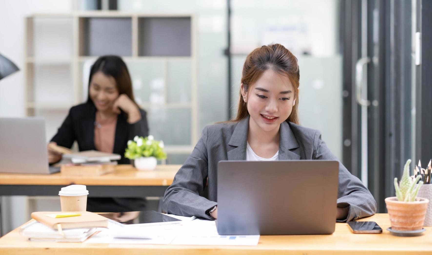 Modern computer setup showing investment platform interface